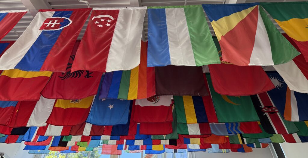 colorful flags hanging from the ceiling